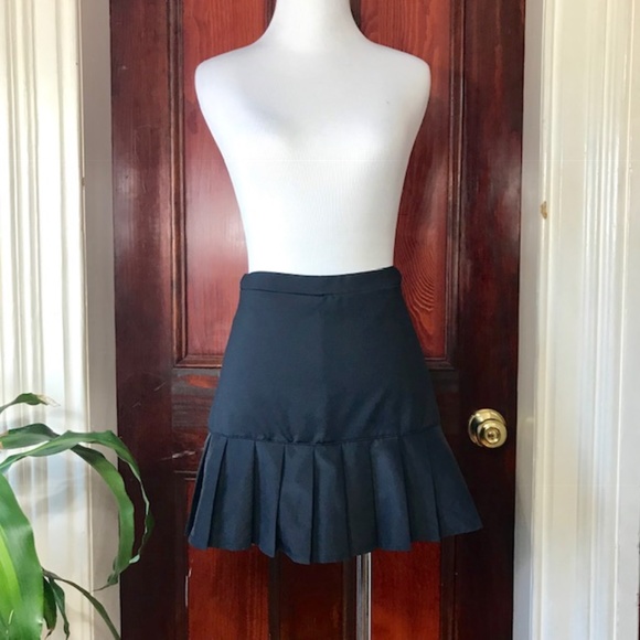 Fila Dresses & Skirts - Fila black pleated tennis / athletic skort skirt